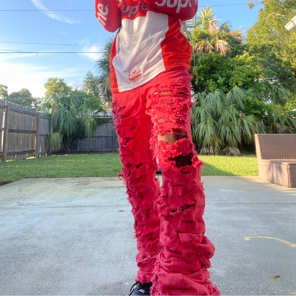 Red stacked jeans